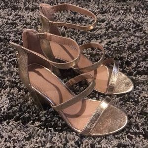 Gold high heels